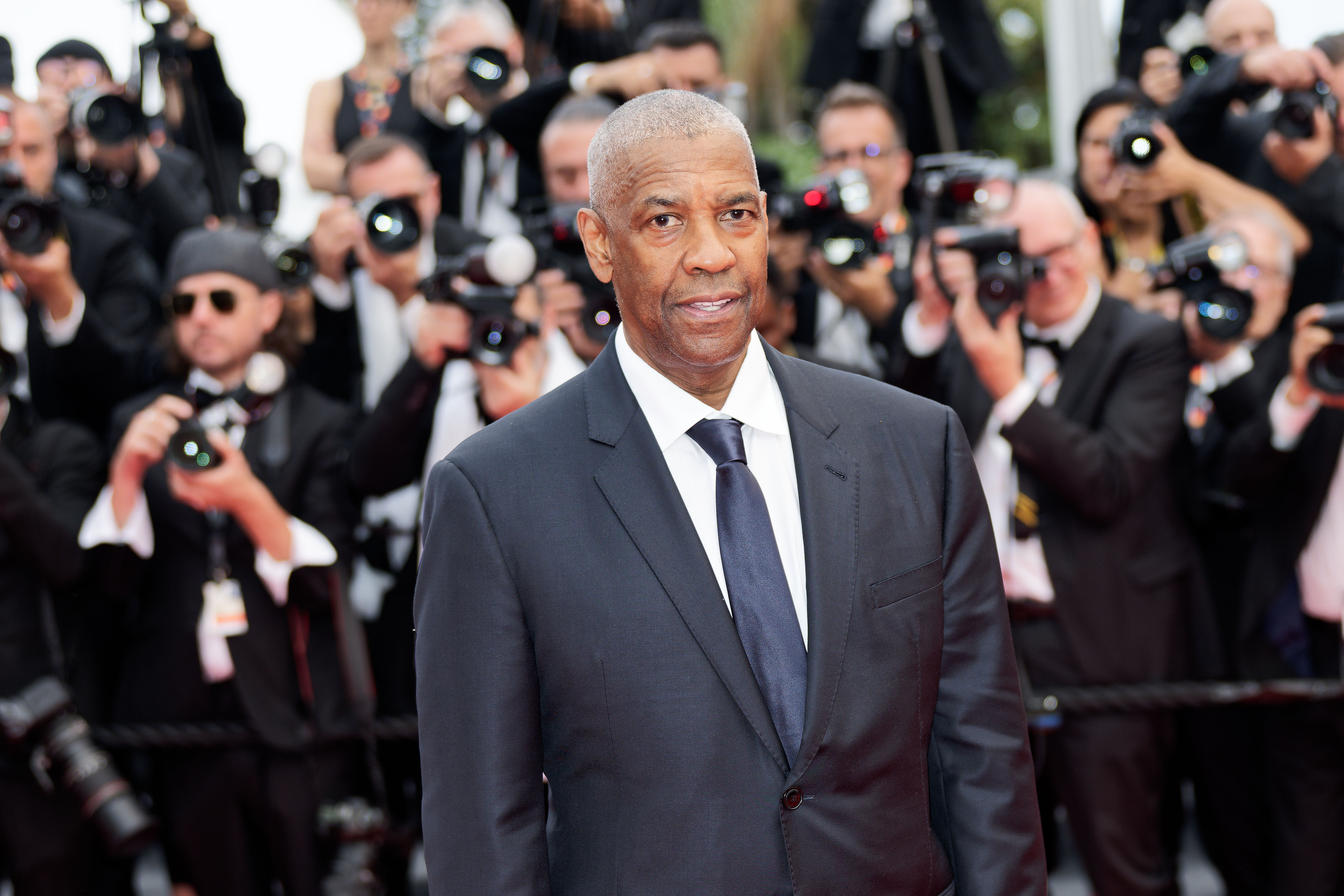 Oop! Denzel Washington Trends After Footage Captured Him Seemingly Checking Photographer Who Got Too Handsy At Cannes