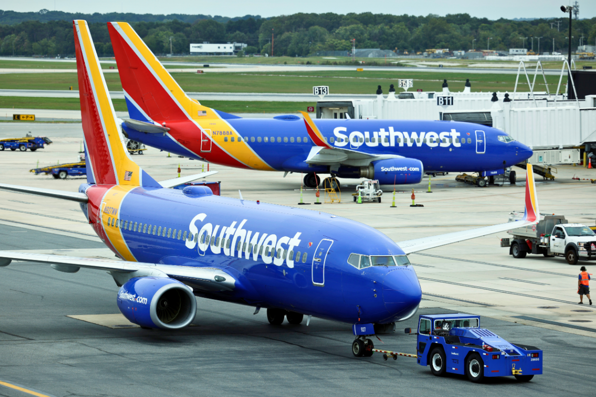 Woman Gets Kicked Off Southwest Airlines Flight After Hair-Pulling, Spitting Incident Over Seating Dispute (VIDEO)