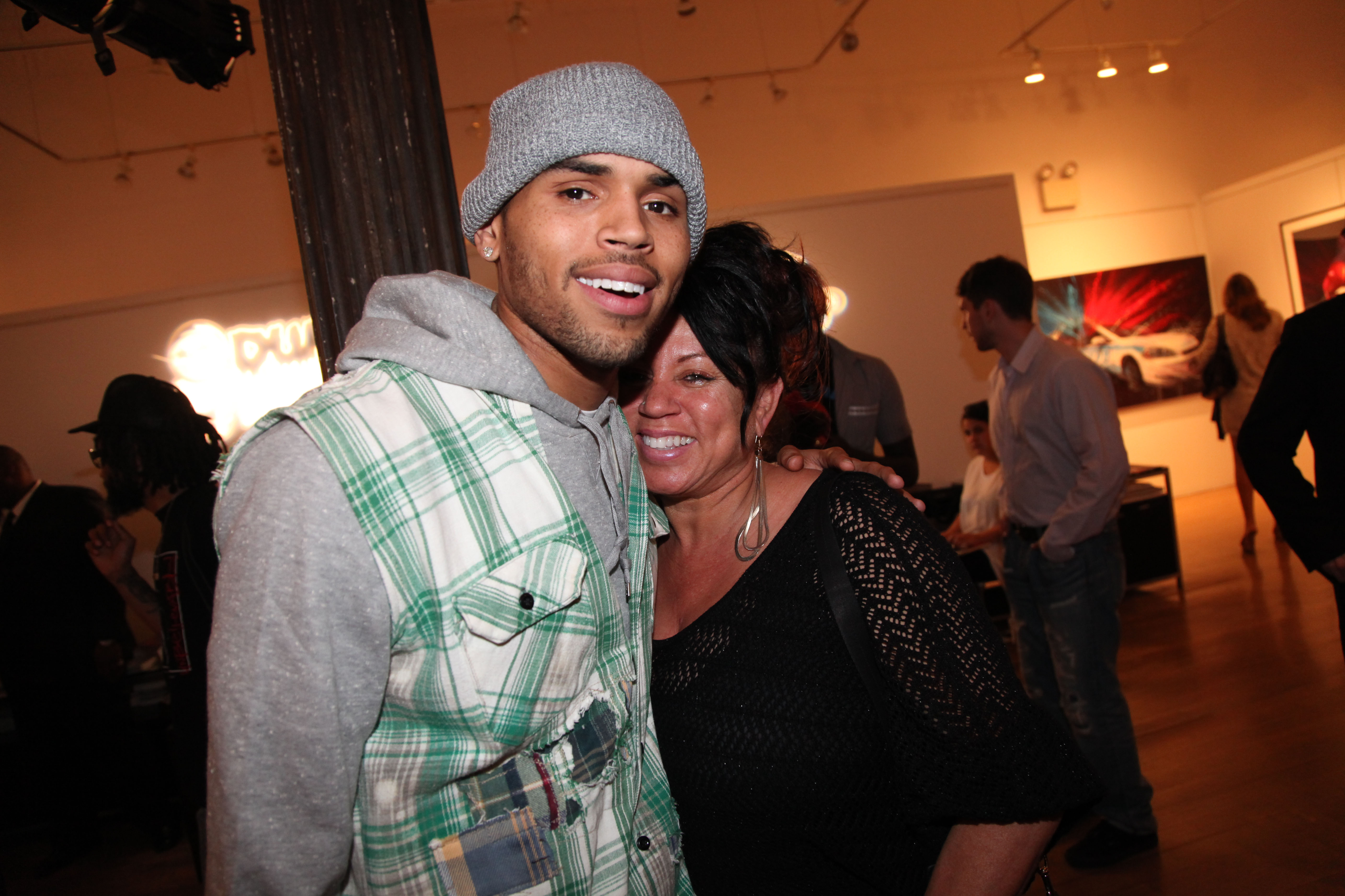 Proud Parent Vibes! Chris Brown's Mom Reenacts His Epic Flying Moment At 'Breezy Bowl' Tour (VIDEOS)