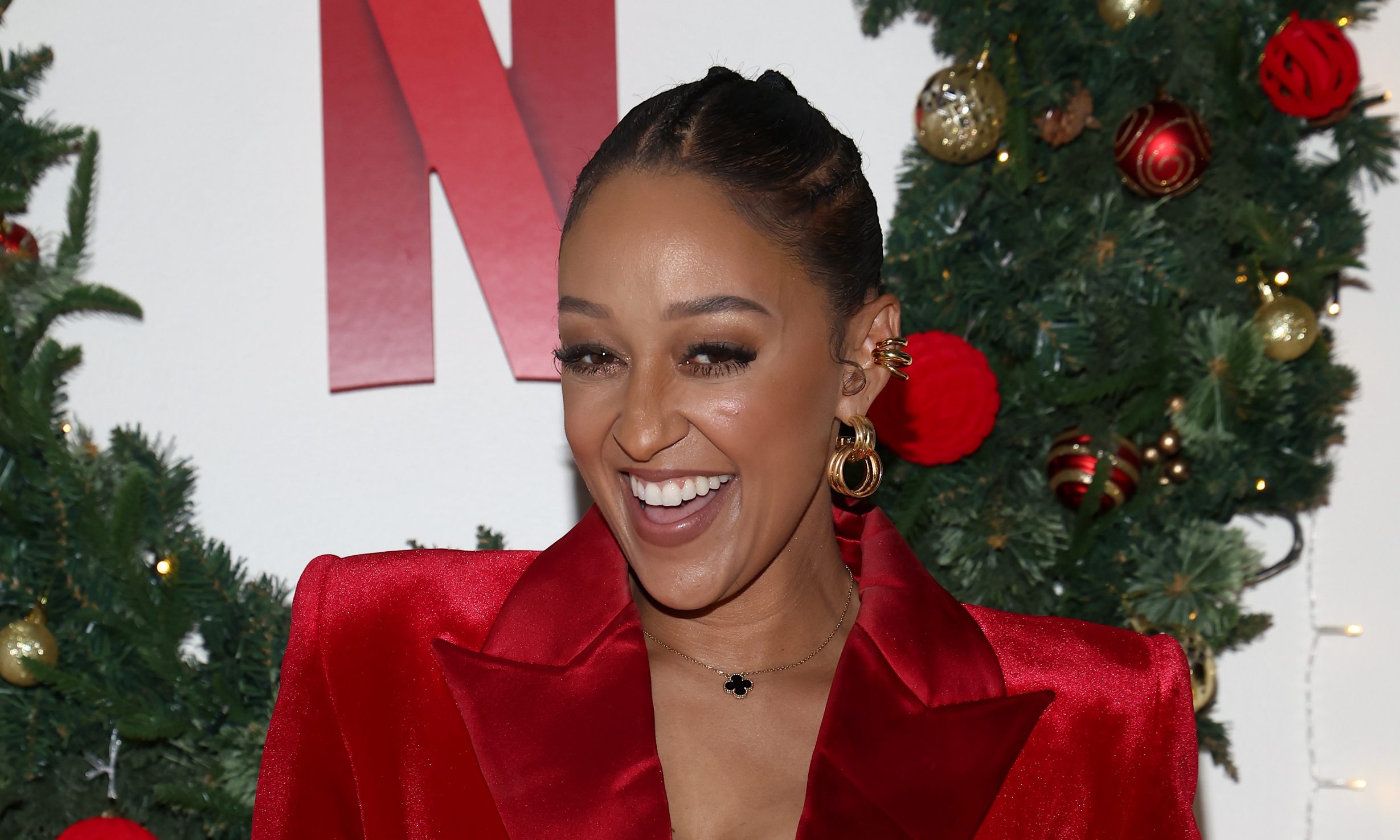 Tia Mowry Sparks Questions Mystery Man Hand Appears In Selfie Photo