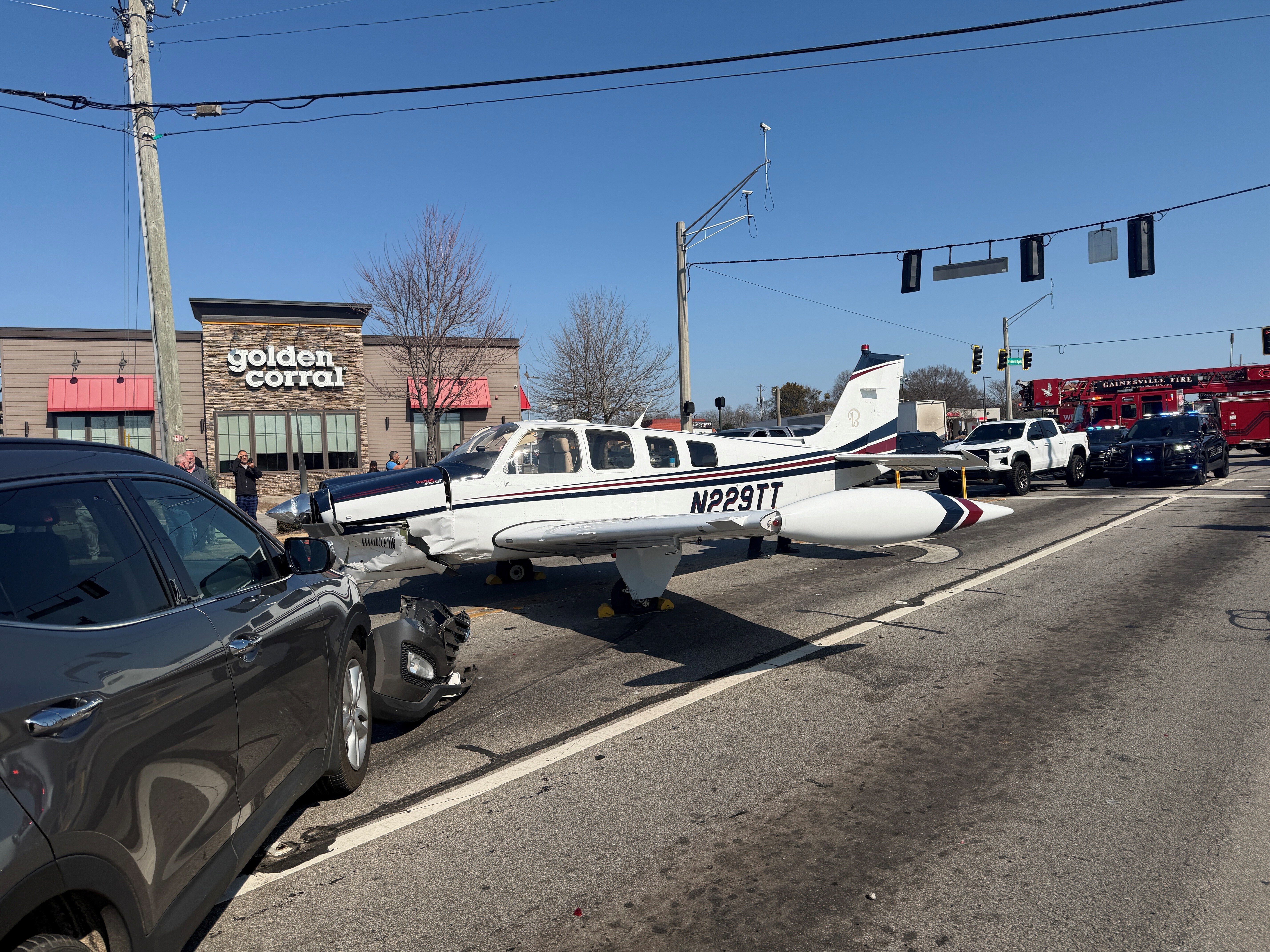 Oh Wow! Three Vehicles Hit After Small Plane Makes Emergency Landing On Busy Georgia Road (WATCH)